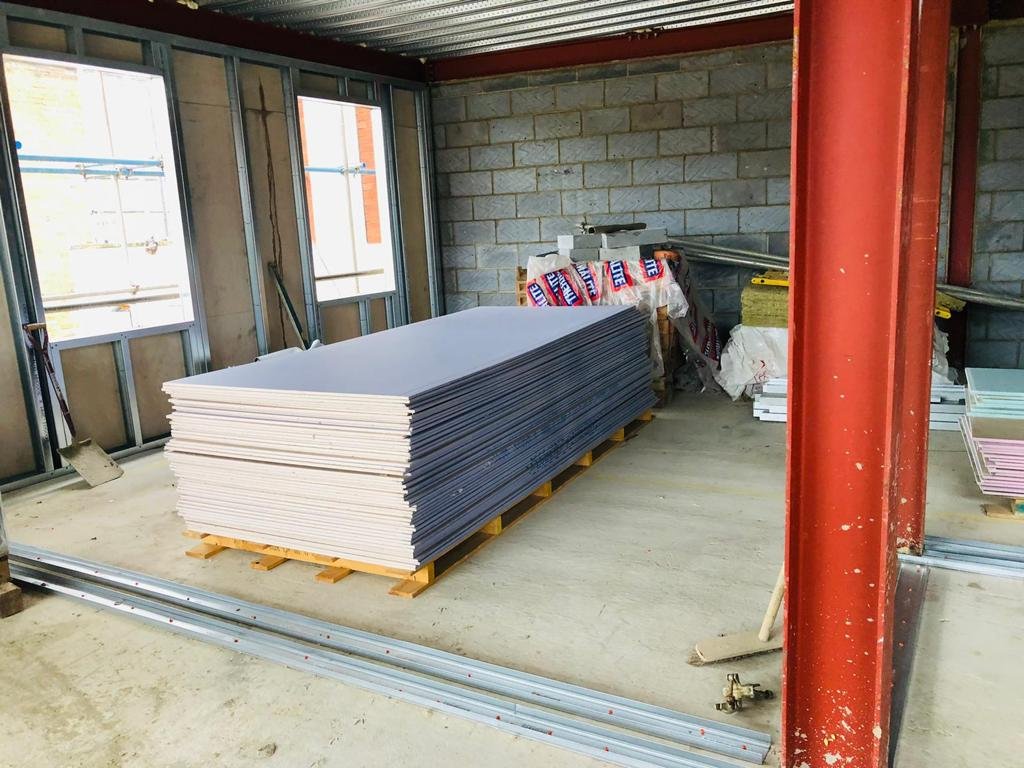 Plasterboard installation to form new internal walls.