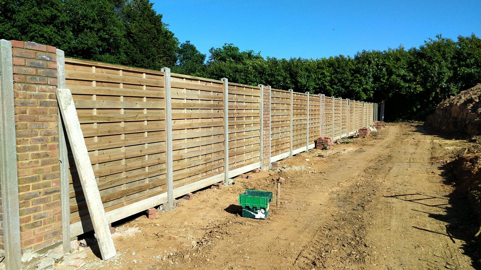 Approximately 100m of new fence panels with concrete posts.