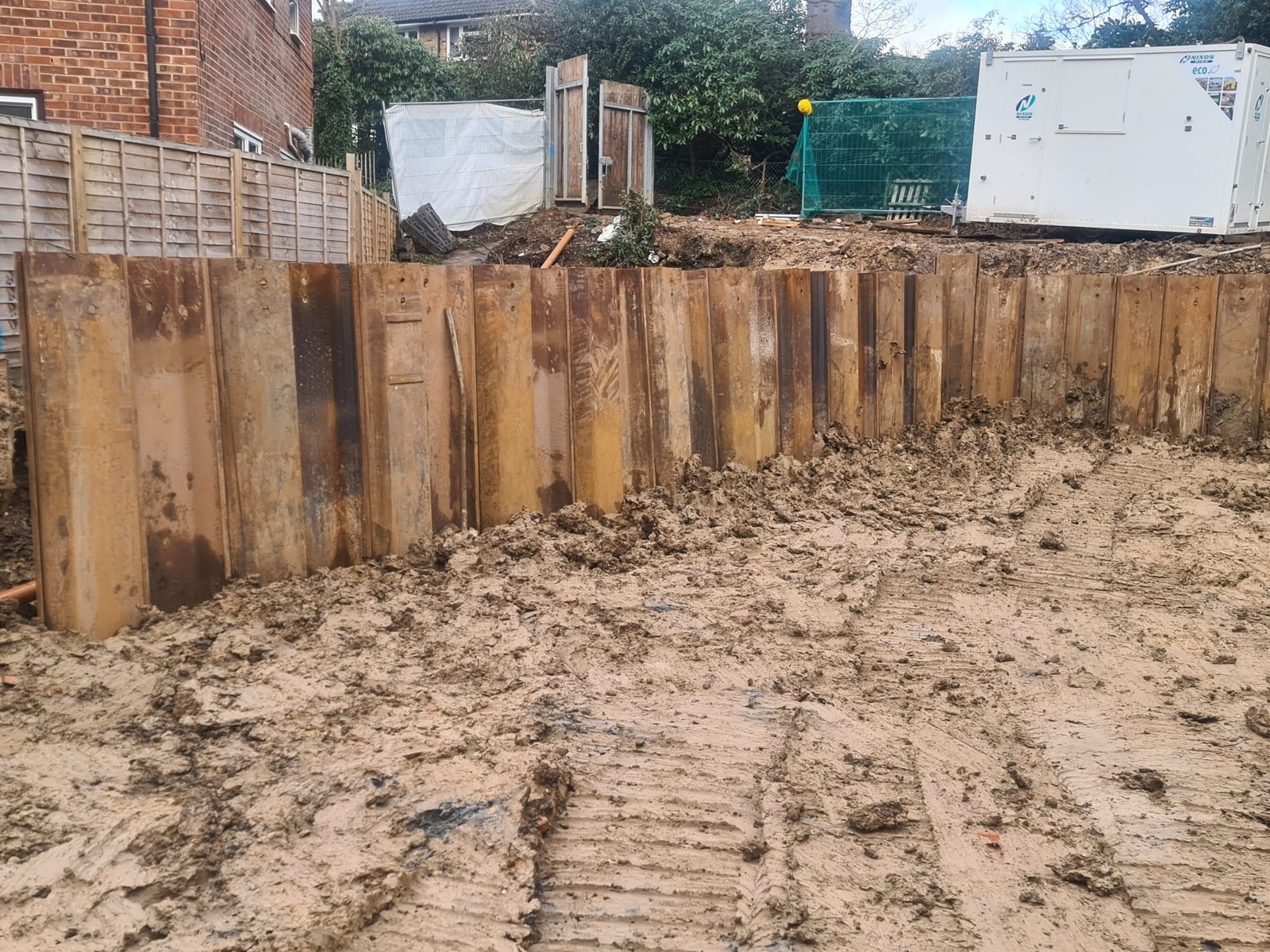 Structural sheet piling prior to excavation.